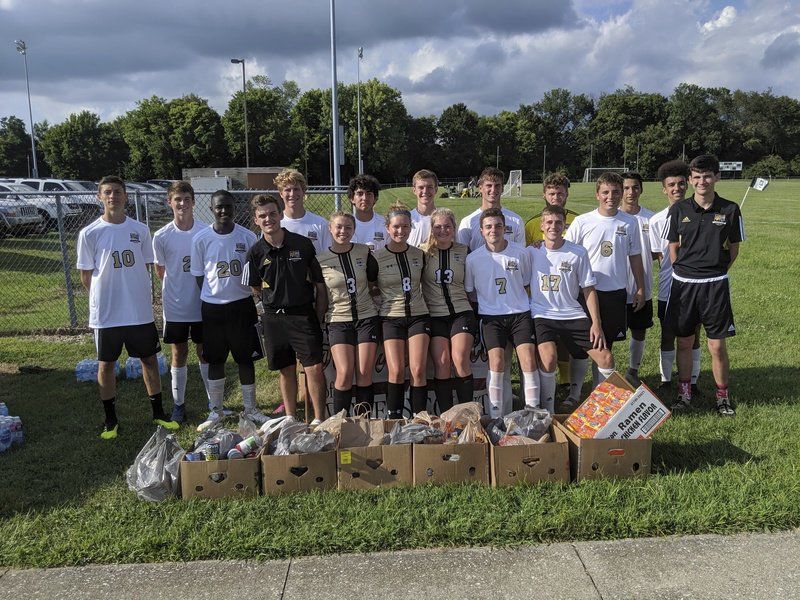 WHS soccer teams donate food items